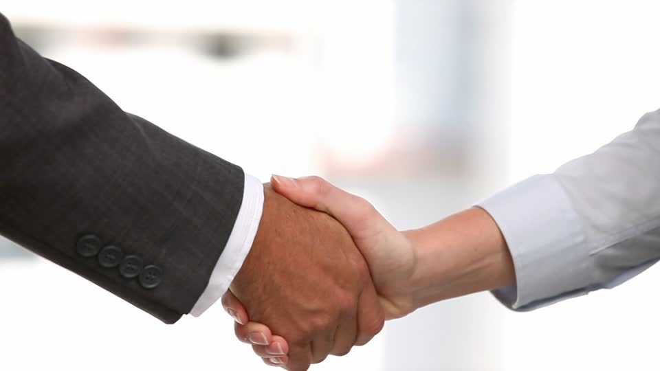 702959352-sleeve-agreement-congratulating-handshake